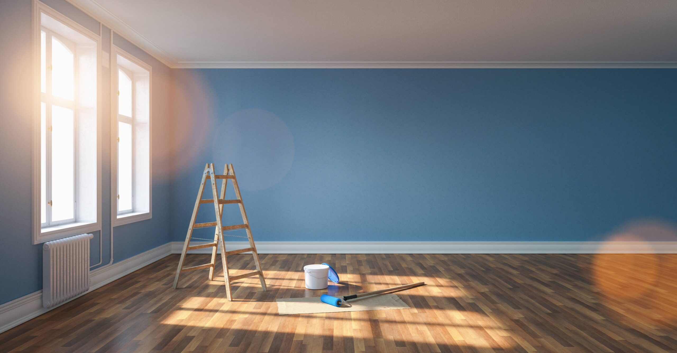 A room undergoing renovation with freshly painted blue walls. A ladder, paint bucket, and painting tools are placed on the wooden floor, and white-framed windows provide natural light. The scene represents a typical home improvement or renovation project.