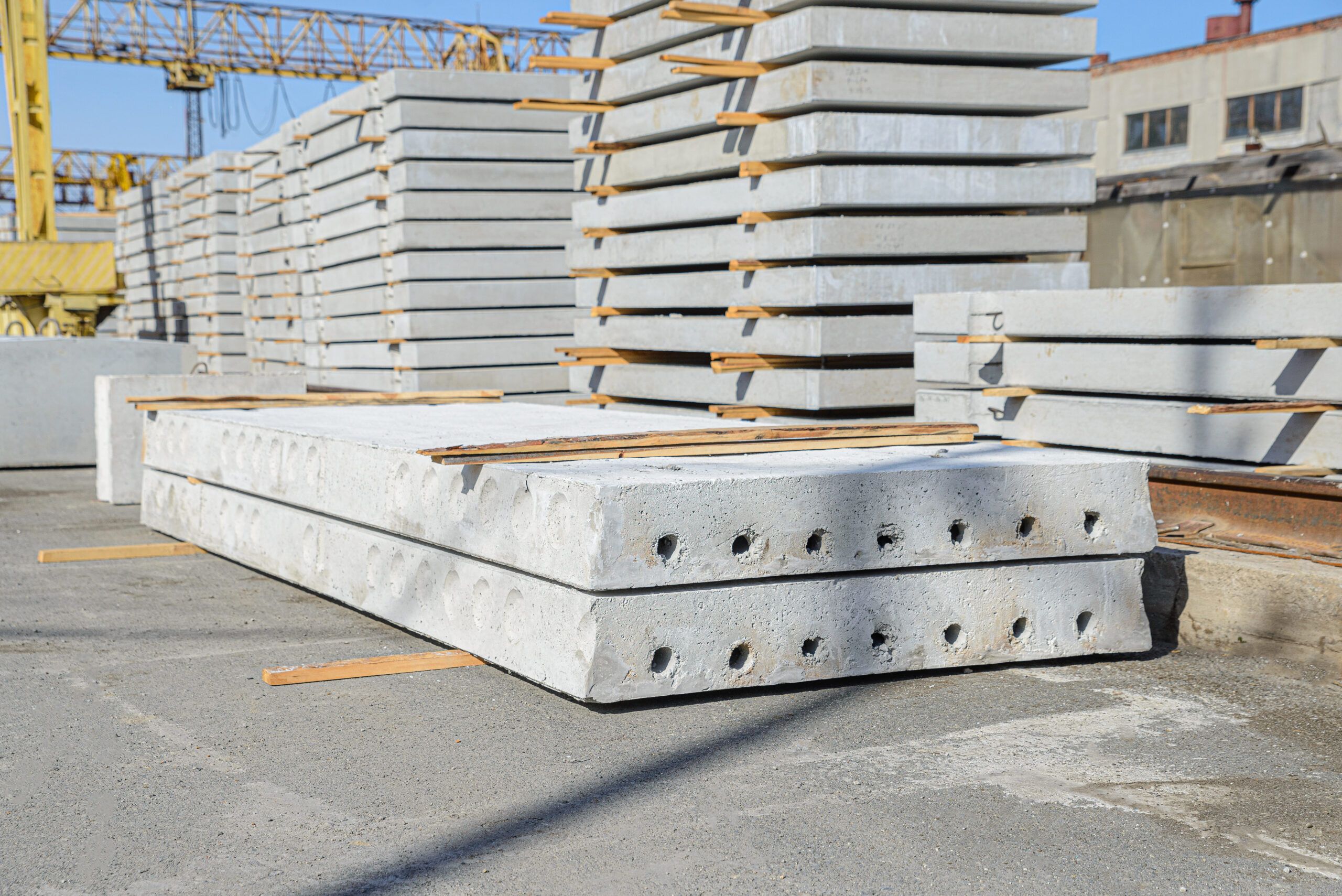 Stacked concrete blocks prepared for construction projects, showcasing durable materials used in Precast Services in Quebec for walls, foundations, and retaining structures.