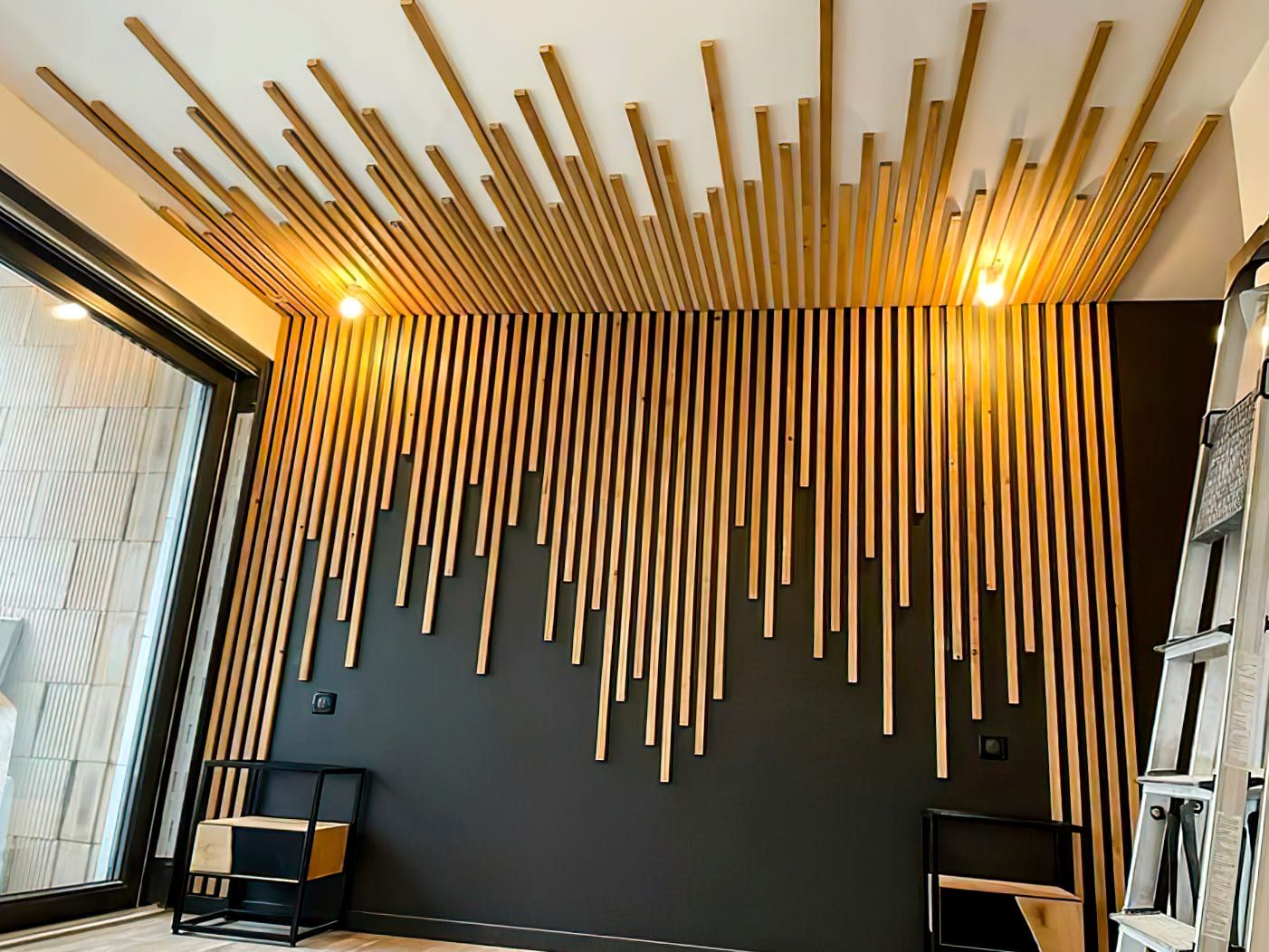 Modern wall and ceiling design with decorative wooden slat panels used as accent walls, showcasing stylish interior wall decoration in Quebec that combines texture, insulation, and acoustic comfort.